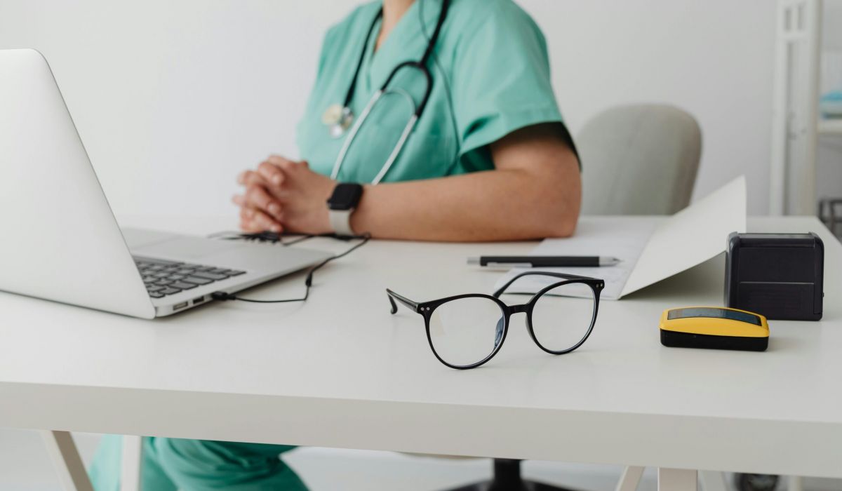 Dr sitting at desk